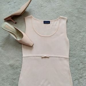 Blush knit top with bow